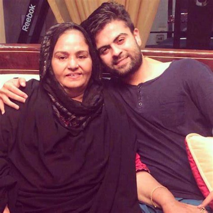 Ahmad with his mother Altovise Ferguson