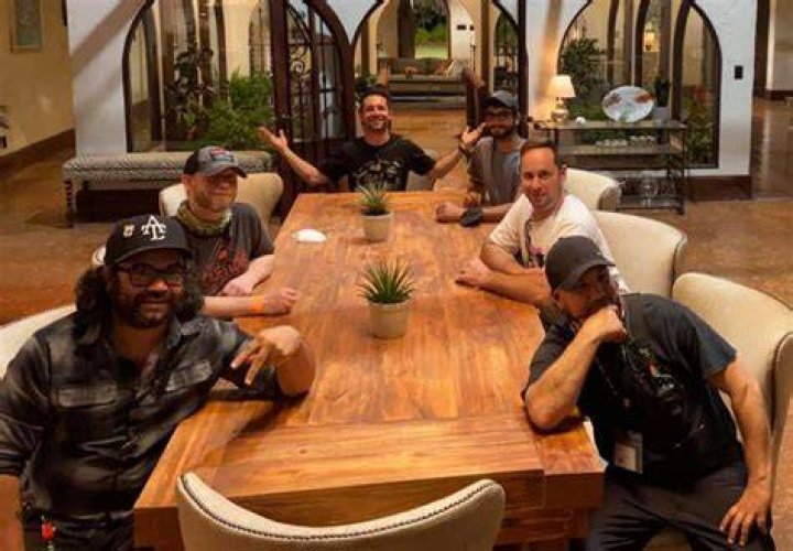 Albert Olmstead with the crew members of Cobra Kai