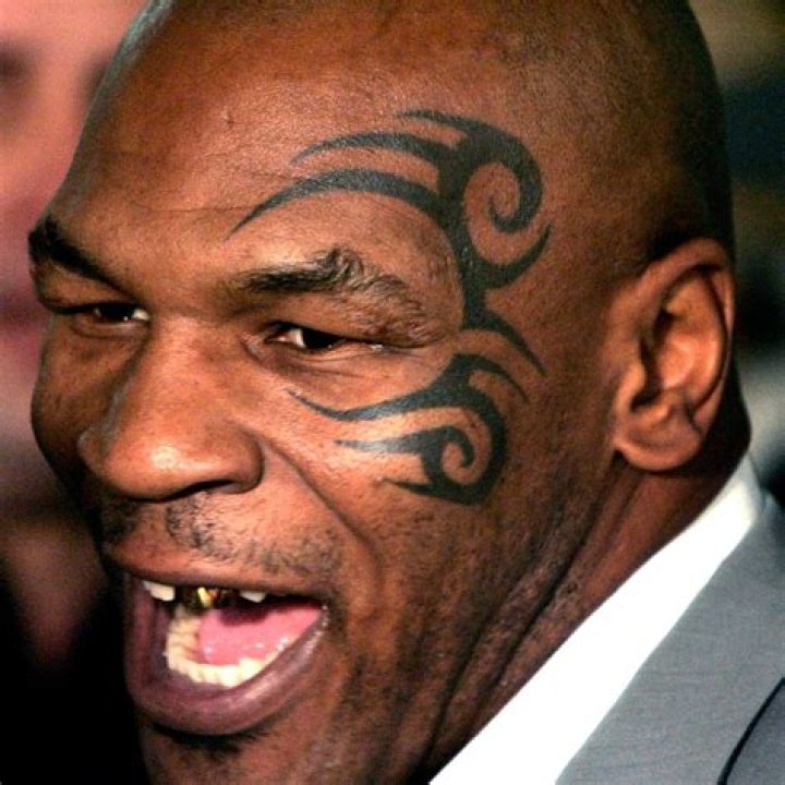 Boxer Tribal Face Tattoo