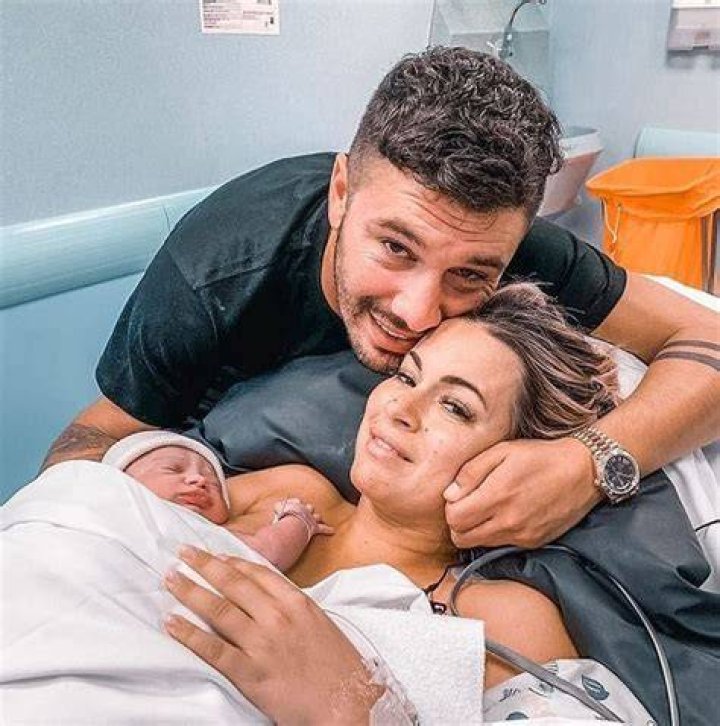 Carla Moreau photographed after giving birth to her daughter Ruby Guedj