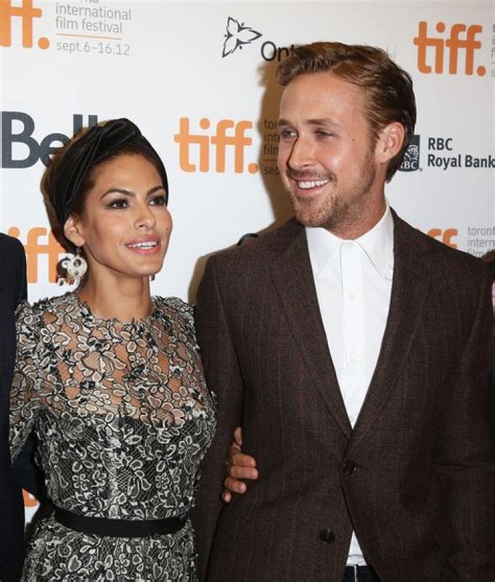 Eva Mendes with Ryan Gosling at a movie premiere