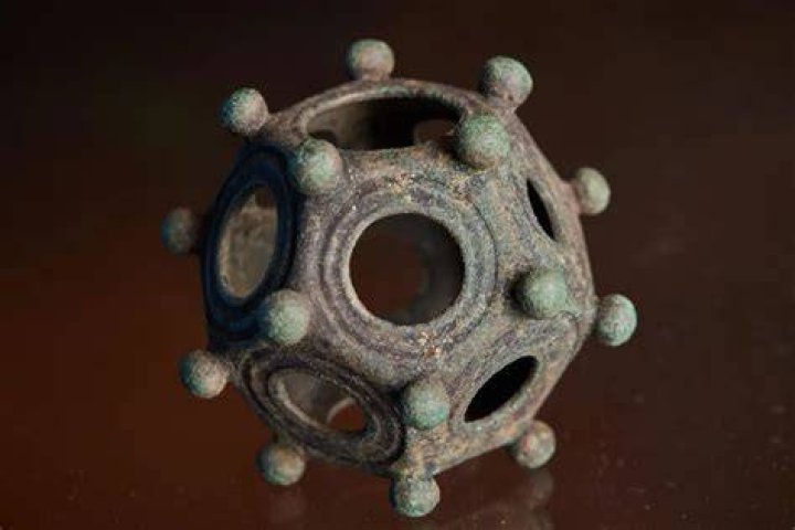 Holding The Roman Dodecahedron