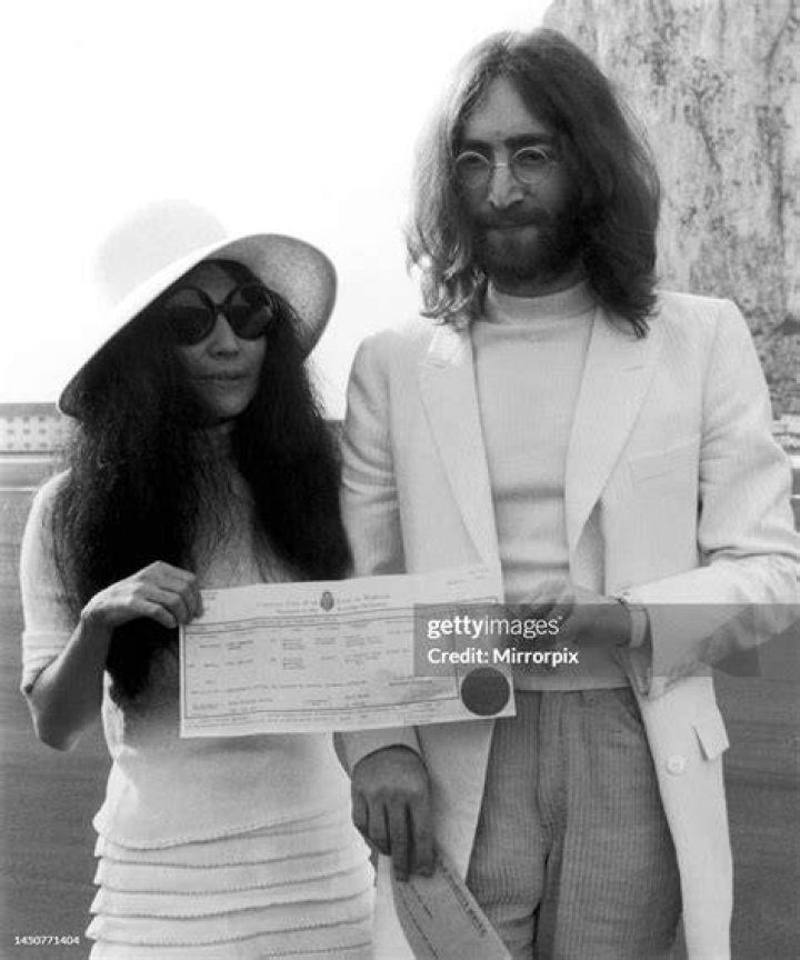 John Lennon Holding Yoko
