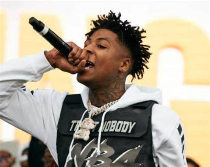 NBA YoungBoy Shows Off Plaque For Having 100 Platinum & Gold Singles