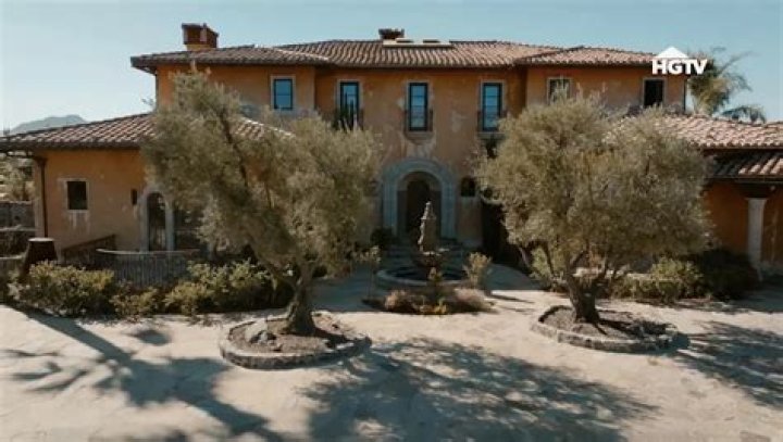 The Bachelor Mansion shot from the outside at night