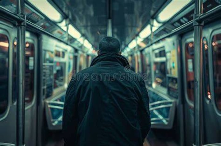 Walking Through A Subway Car
