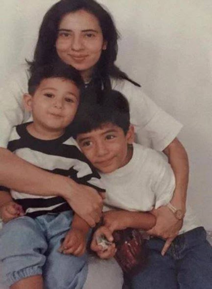 Young Orry with his mother and brother